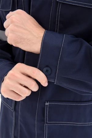 Костюм мужской МЕГАСТАТОЙЛ  от нефтепродуктов, кратковременного воздействия пламени, статического электричества, темно-синий/серый/оранж Кос 907